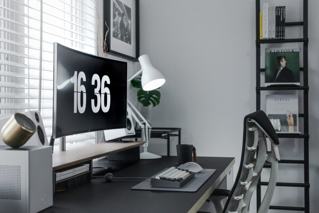 Minimal gaming setup side view with ultrawide monitor